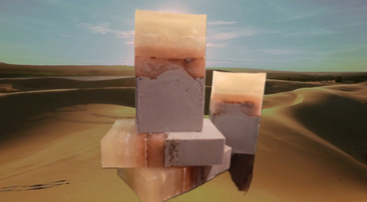 Handmade organic Egyptian Musk body bar 𓂀 with golden triple butter swirl and lime zest flecks, regal gold mica on obsidian stone, ancient luxury spa vibe