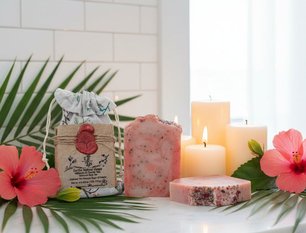 Handmade organic hibiscus tea aloe and nectar body bar with dried hibiscus petals and aloe flecks, vibrant pink swirl, on marble with fresh flowers