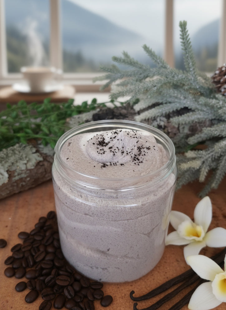 Close-up of handmade organic vanilla coffee whipped sugar scrub in a jar with coffee beans and vanilla pods, creamy texture, natural skincare exfoliant